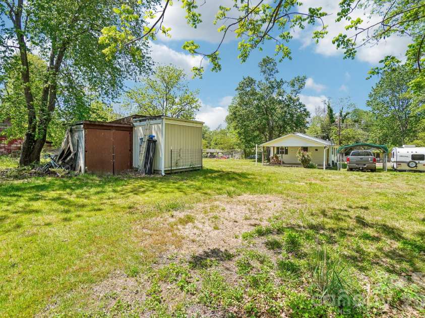 235 Gull Avenue, East Flat Rock, NC 28726.  MLS# CAR4373361, YatesRealty ID 15454. 2nd tool shed (red one) with doors.