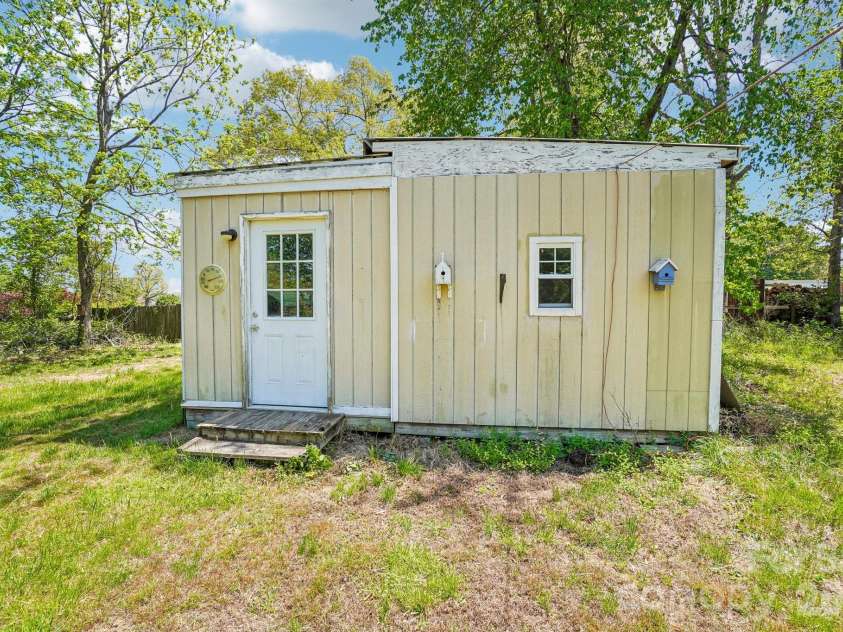 235 Gull Avenue, East Flat Rock, NC 28726.  MLS# CAR4373361, YatesRealty ID 15454. Well-built workshop/shed. Could be converted to tiny home easily. County allows STR and additional structures on property (buyer agent to call county to verify).