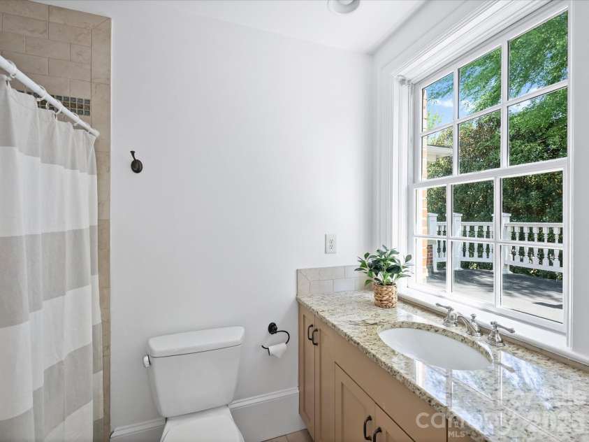 242 Hillside Avenue, Charlotte, NC 28209.  MLS# CAR4371887, YatesRealty ID 15455. En-suite secondary bedroom/bath