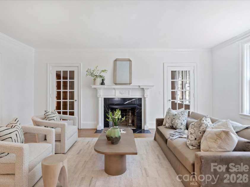 242 Hillside Avenue, Charlotte, NC 28209.  MLS# CAR4371887, YatesRealty ID 15455. Living room with fireplace