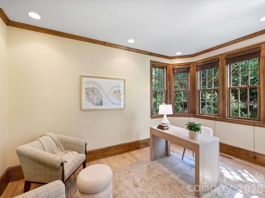 242 Hillside Avenue, Charlotte, NC 28209.  MLS# CAR4371887, YatesRealty ID 15455. Main level office with amazing windows