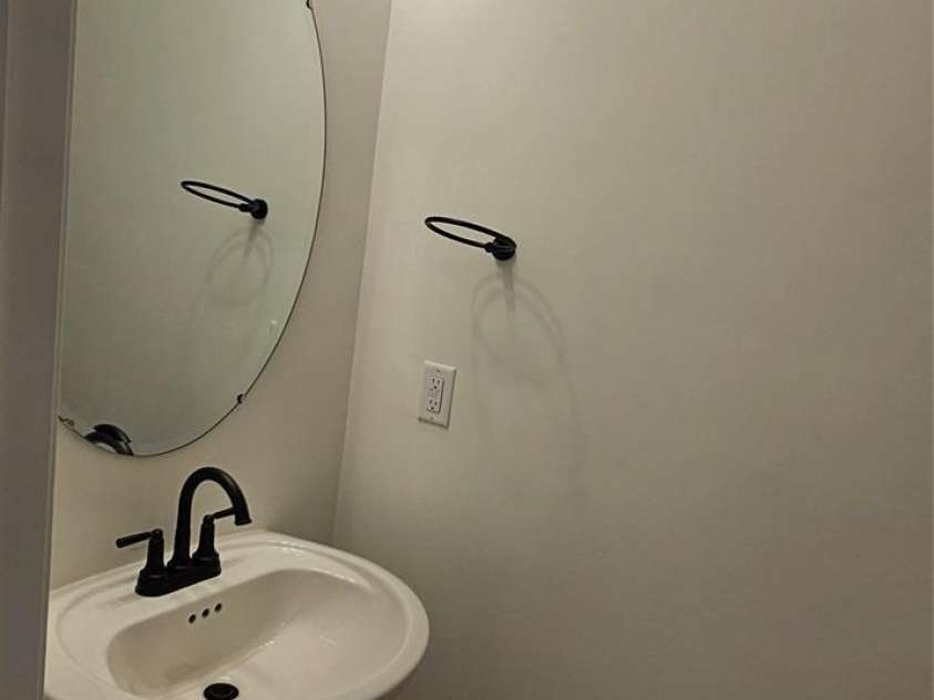 362 Moore Avenue, Mooresville, NC 28115.  MLS# CAR4255939, YatesRealty ID 15460. Unit A powder room