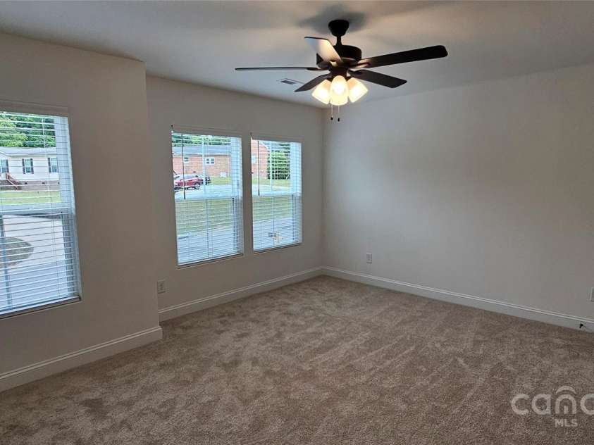 362 Moore Avenue, Mooresville, NC 28115.  MLS# CAR4255939, YatesRealty ID 15460. Unit B primary bedroom