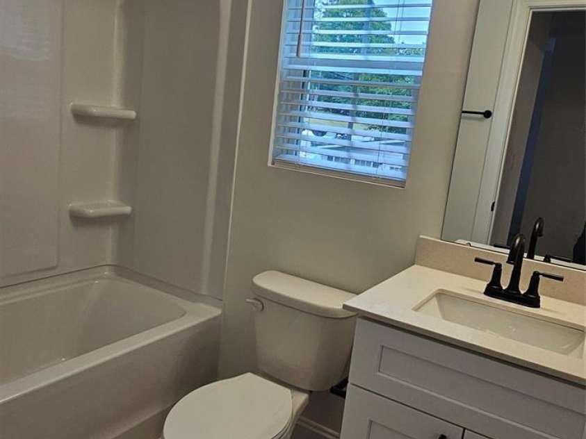 382 Moore Avenue, Mooresville, NC 28115.  MLS# CAR4255955, YatesRealty ID 15461. Unit A hall bath