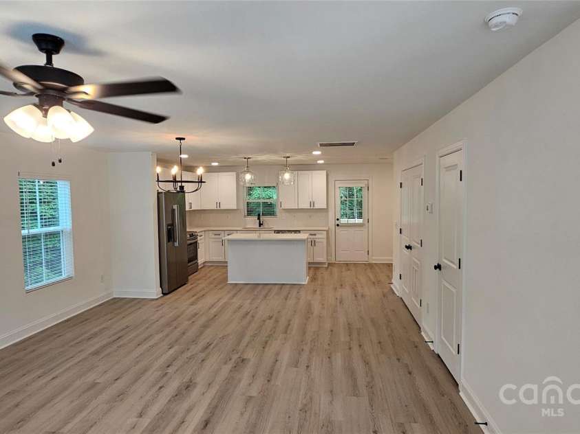 382 Moore Avenue, Mooresville, NC 28115.  MLS# CAR4255955, YatesRealty ID 15461. Unit A living, view #1