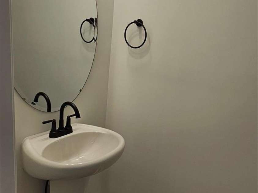 382 Moore Avenue, Mooresville, NC 28115.  MLS# CAR4255955, YatesRealty ID 15461. Unit A powder room