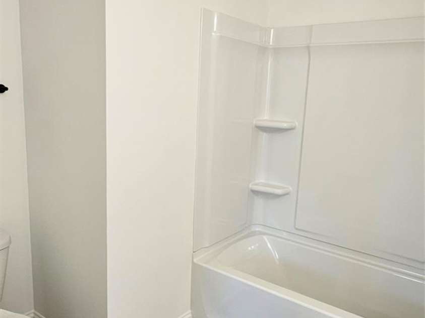 382 Moore Avenue, Mooresville, NC 28115.  MLS# CAR4255955, YatesRealty ID 15461. Unit B primary bath, view #1