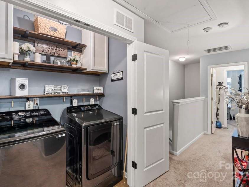 9408 Hamel Street, Charlotte, NC 28215.  MLS# CAR4213263, YatesRealty ID 15462. Laundry area