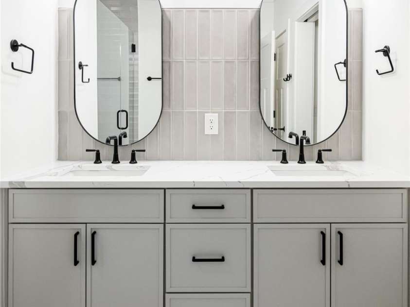 15 Maggies Lane, Asheville, NC 28803.  MLS# CAR4183002, YatesRealty ID 15463. Double vanity with designer tile detail on the walls