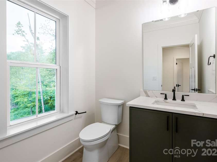 15 Maggies Lane, Asheville, NC 28803.  MLS# CAR4183002, YatesRealty ID 15463. Half bath on the main level