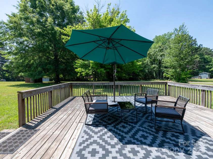 7728 Babe Stillwell Farm Road, Huntersville, NC 28078.  MLS# CAR4255046, YatesRealty ID 15464. Expansive deck.