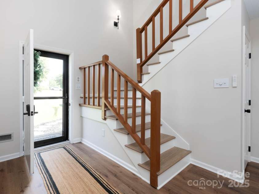 7728 Babe Stillwell Farm Road, Huntersville, NC 28078.  MLS# CAR4255046, YatesRealty ID 15464. Foyer - wide plank LVP throughout main level
