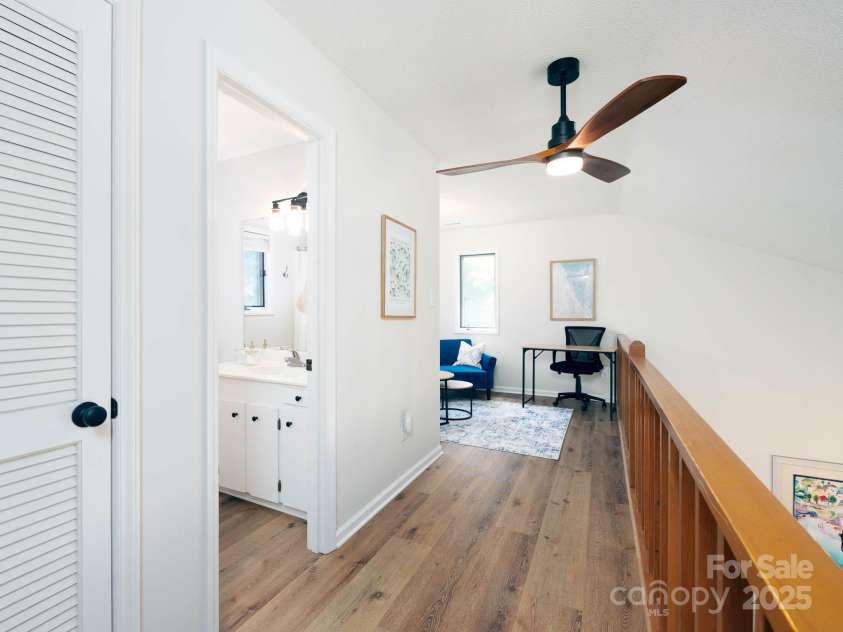 7728 Babe Stillwell Farm Road, Huntersville, NC 28078.  MLS# CAR4255046, YatesRealty ID 15464. Upstairs hall.  LVP throughout second level.