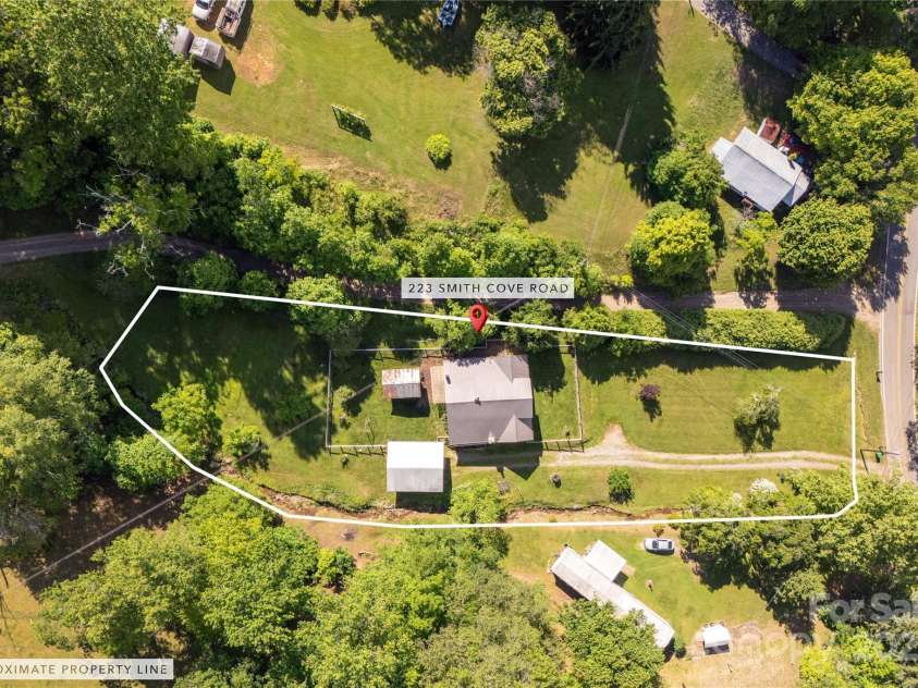 223 Smith Cove Road, Candler, NC 28715.  MLS# CAR4260710, YatesRealty ID 15466. 
