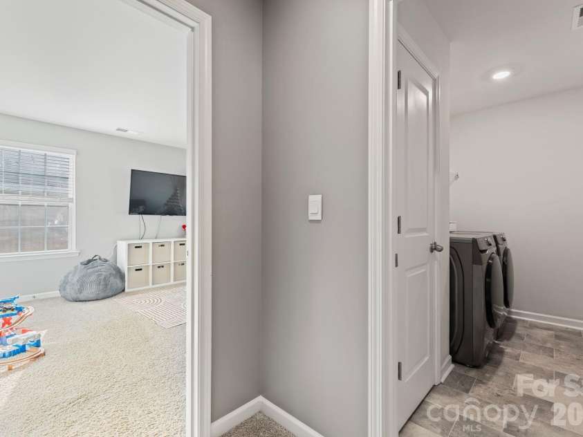 9777 Tea Garden Drive, Gastonia, NC 28056.  MLS# CAR4351279, YatesRealty ID 15467. Laundry room