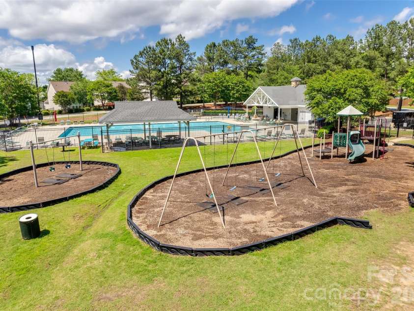 1114 Sienna Sand Way, Fort Mill, SC 29708.  MLS# CAR4360658, YatesRealty ID 15470. Clubhouse and Pool
