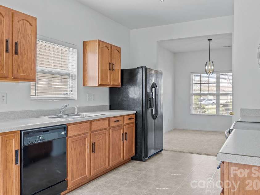 9006 Corey Common Avenue, Charlotte, NC 28216.  MLS# CAR4353807, YatesRealty ID 15474. 