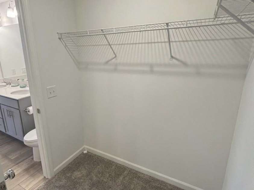 2105 Riverstone Boulevard, Monroe, NC 28110.  MLS# CAR4365932, YatesRealty ID 15477. Primary bedroom walk in closet
