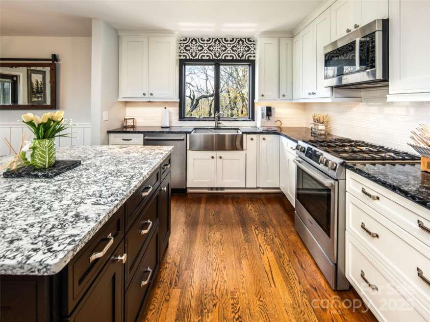 4344 Eagles Nest Road, Waynesville, NC 28786.  MLS# CAR4261425, YatesRealty ID 15485. KITCHEN OPENS TO DINING AREA