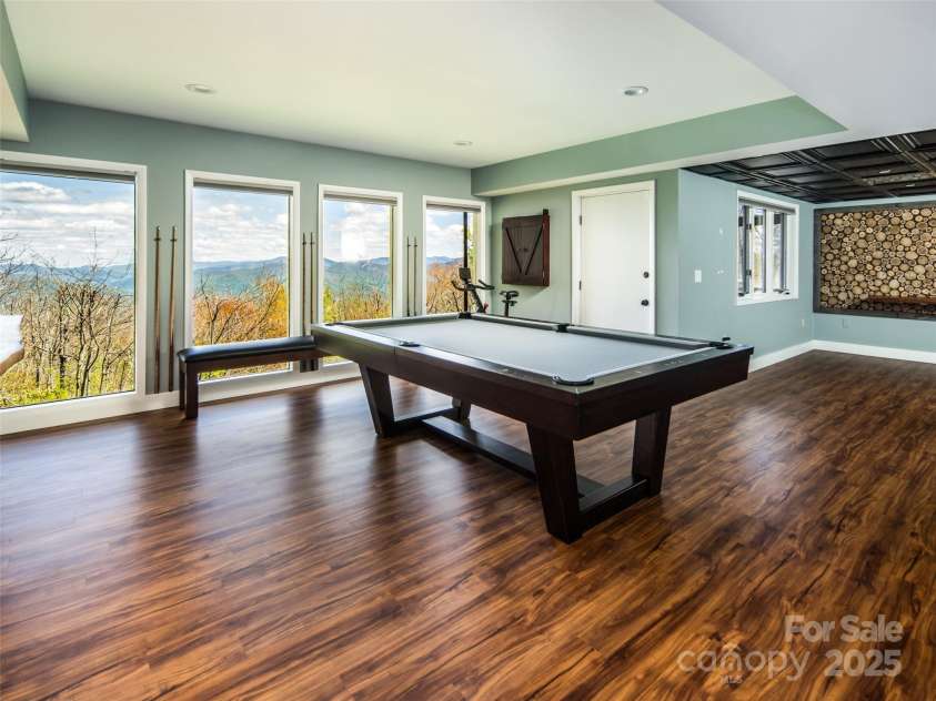 4344 Eagles Nest Road, Waynesville, NC 28786.  MLS# CAR4261425, YatesRealty ID 15485. LOWER LEVEL REC ROOM WITH POOL/ PING PONG TABLE, VIEWS INCLUDED!
