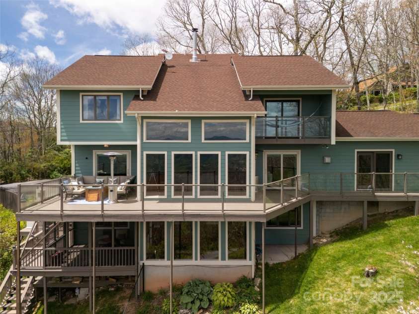 4344 Eagles Nest Road, Waynesville, NC 28786.  MLS# CAR4261425, YatesRealty ID 15485. NICE SCREENED IN PORCH ON LOWER LEVEL