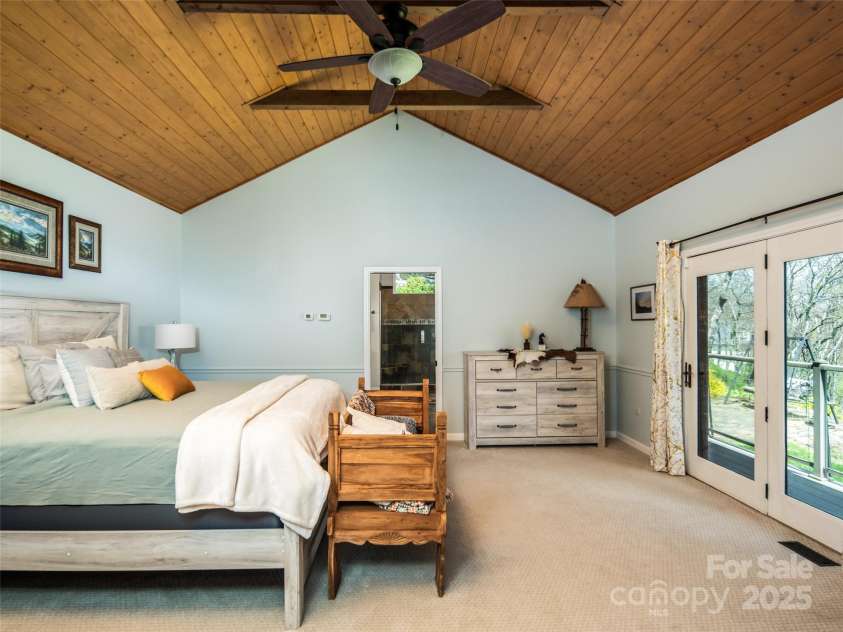 4344 Eagles Nest Road, Waynesville, NC 28786.  MLS# CAR4261425, YatesRealty ID 15485. PRIMARY BEDROOM WITH TONGUE AND GROOVE CEILINGS