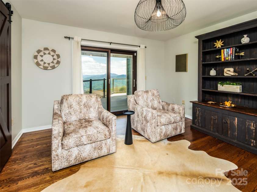 4344 Eagles Nest Road, Waynesville, NC 28786.  MLS# CAR4261425, YatesRealty ID 15485. SITTING ROOM AREA OFF PRIMARY BEDROOM