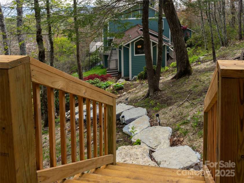 4344 Eagles Nest Road, Waynesville, NC 28786.  MLS# CAR4261425, YatesRealty ID 15485. STEPPING STONES FROM SAUNA TO PATIO