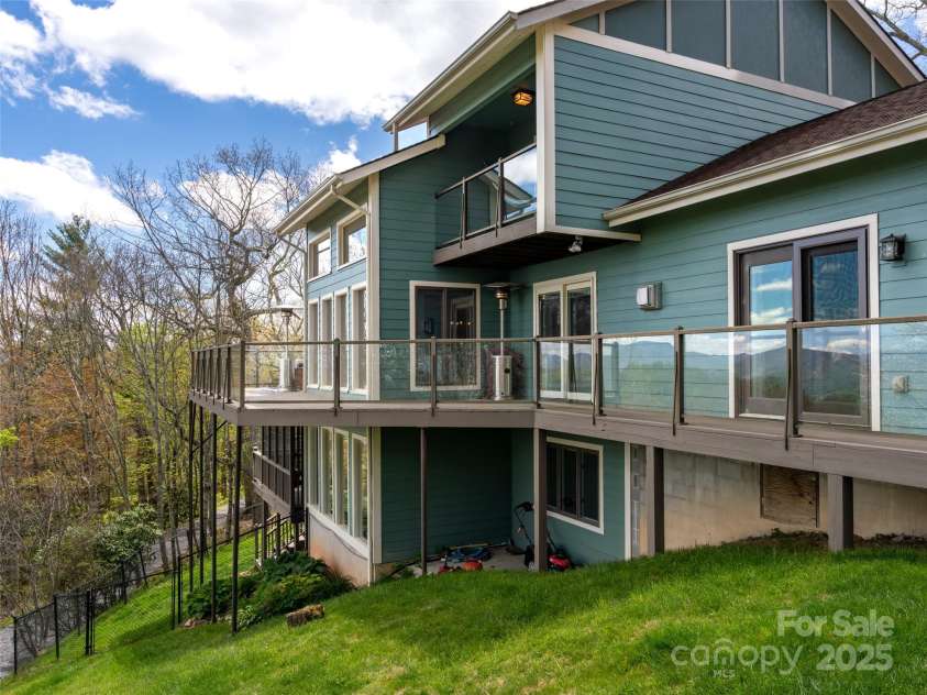 4344 Eagles Nest Road, Waynesville, NC 28786.  MLS# CAR4261425, YatesRealty ID 15485. THREE MAIN LEVEL ENTRANCES TO EXPANSIVE DECK