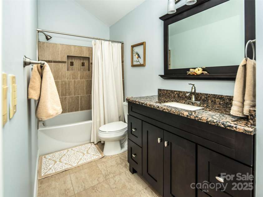 4344 Eagles Nest Road, Waynesville, NC 28786.  MLS# CAR4261425, YatesRealty ID 15485. UPPER LEVEL GUEST BATHROOM