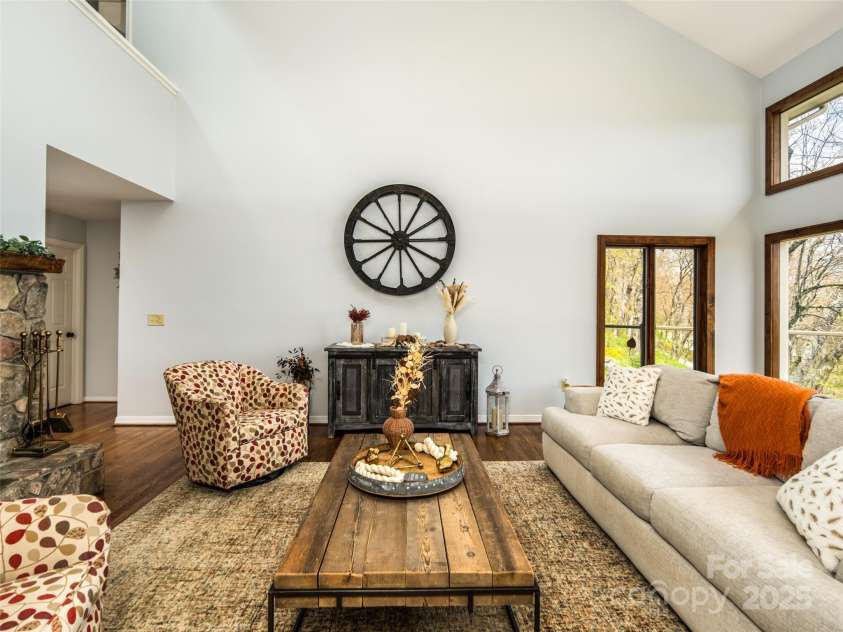 4344 Eagles Nest Road, Waynesville, NC 28786.  MLS# CAR4261425, YatesRealty ID 15485. VIEW OF LIVING ROOM FROM THE DINING AREA