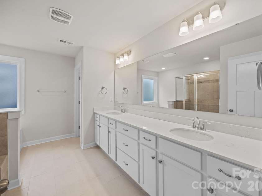 19823 Davidson Concord Road, Davidson, NC 28036.  MLS# CAR4347655, YatesRealty ID 15487. Primary bathroom