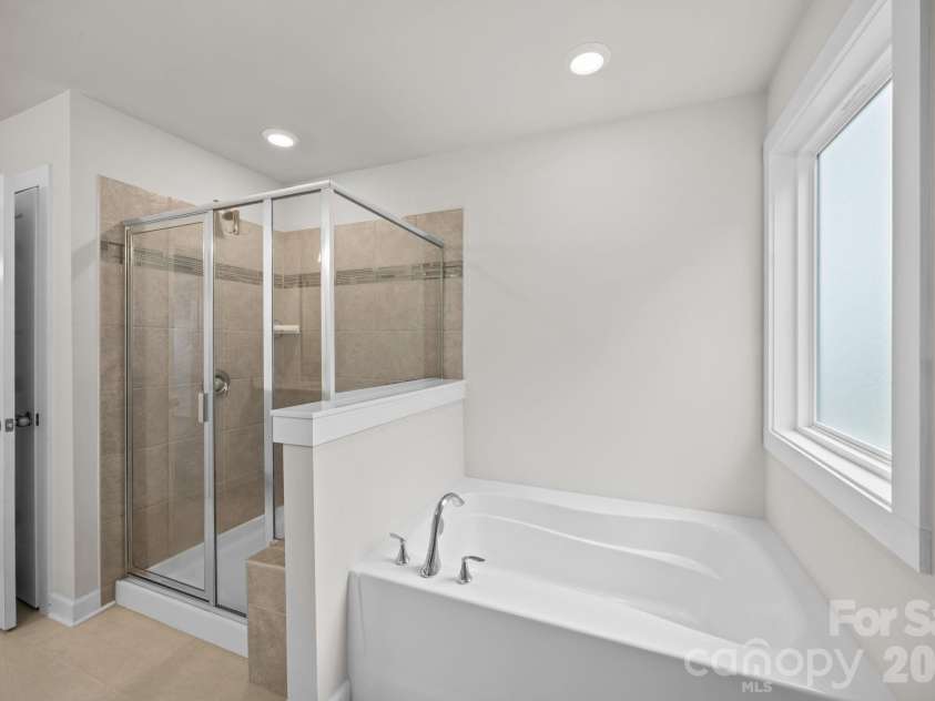 19823 Davidson Concord Road, Davidson, NC 28036.  MLS# CAR4347655, YatesRealty ID 15487. Primary bathroom