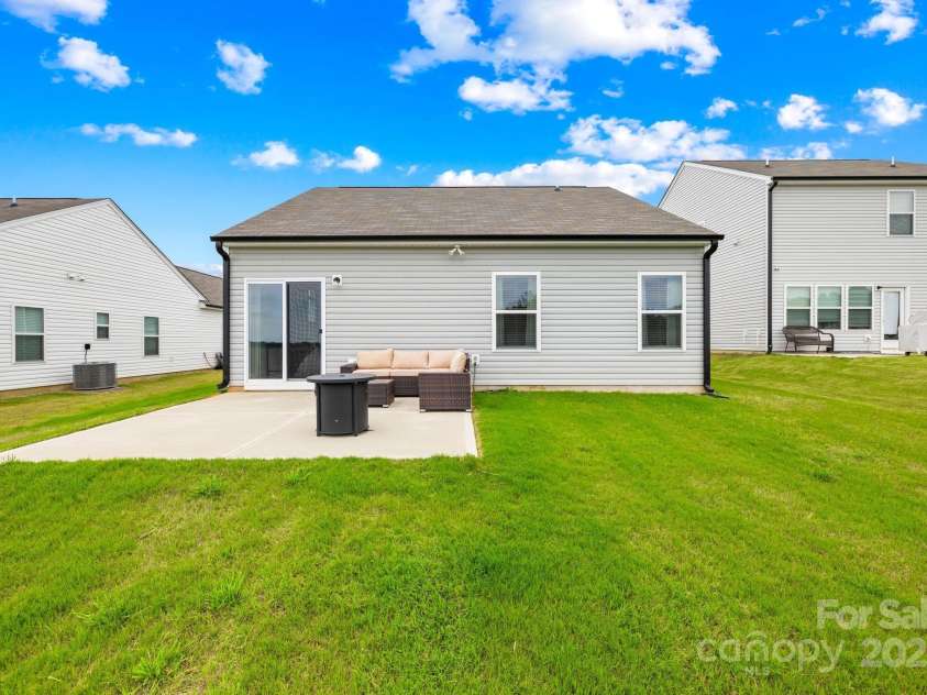 130 Slalom Street, Statesville, NC 28677.  MLS# CAR4264006, YatesRealty ID 15492. Rear view of home