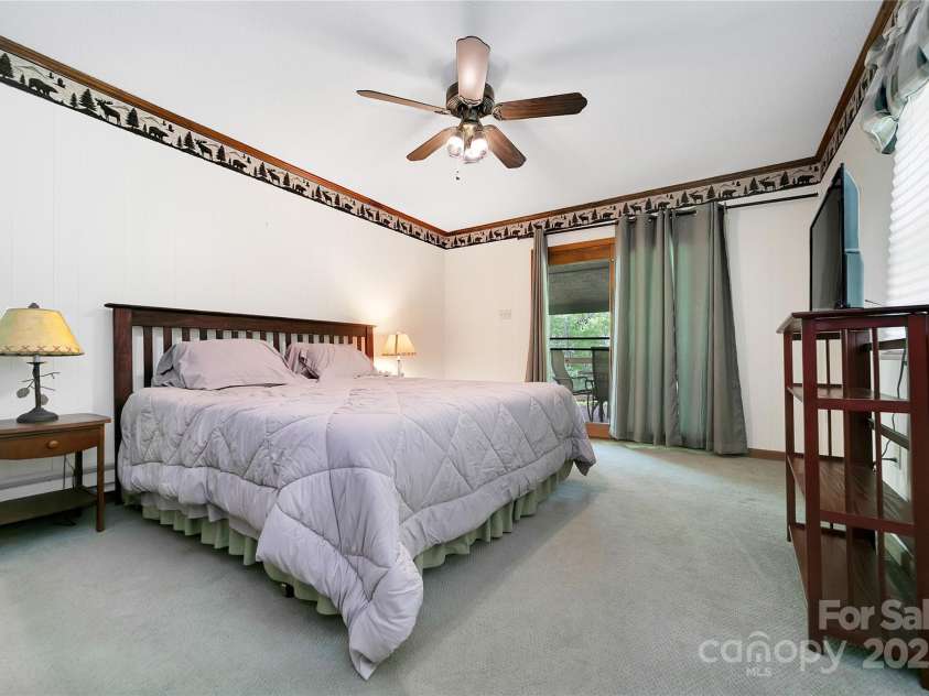 261 Franks Cove Road, Brevard, NC 28712.  MLS# CAR4263831, YatesRealty ID 15496. Primary Bedroom