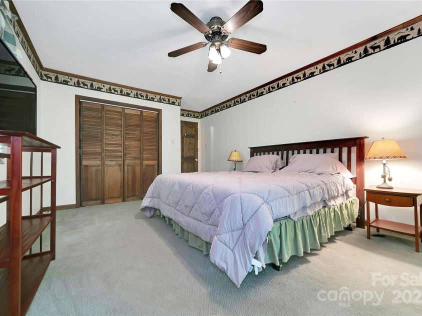 261 Franks Cove Road, Brevard, NC 28712.  MLS# CAR4263831, YatesRealty ID 15496. Primary Bedroom