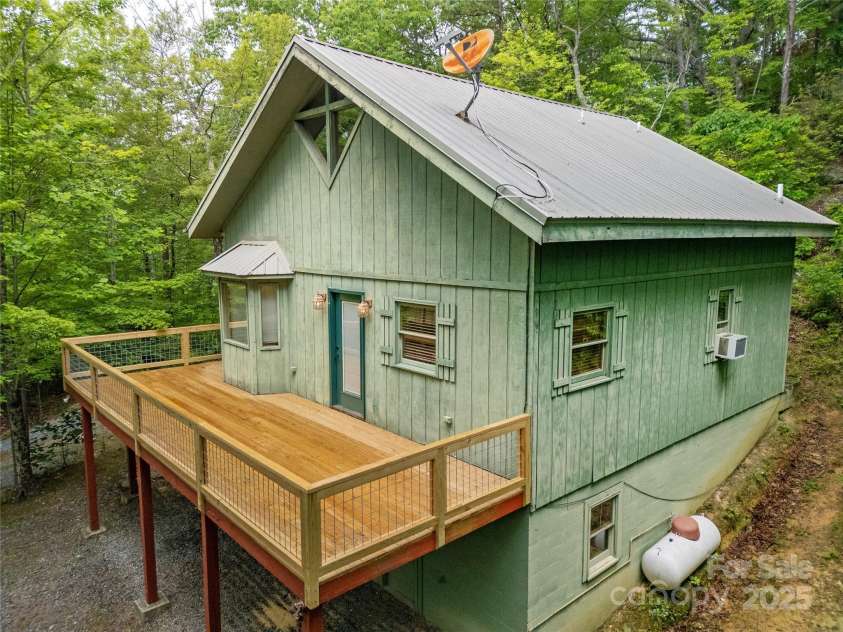 261 Franks Cove Road, Brevard, NC 28712.  MLS# CAR4263831, YatesRealty ID 15496. Side Elevation via Drone