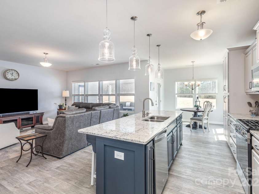 1512 Brooksland Place, Waxhaw, NC 28173.  MLS# CAR4237976, YatesRealty ID 15500. Kitchen & great room