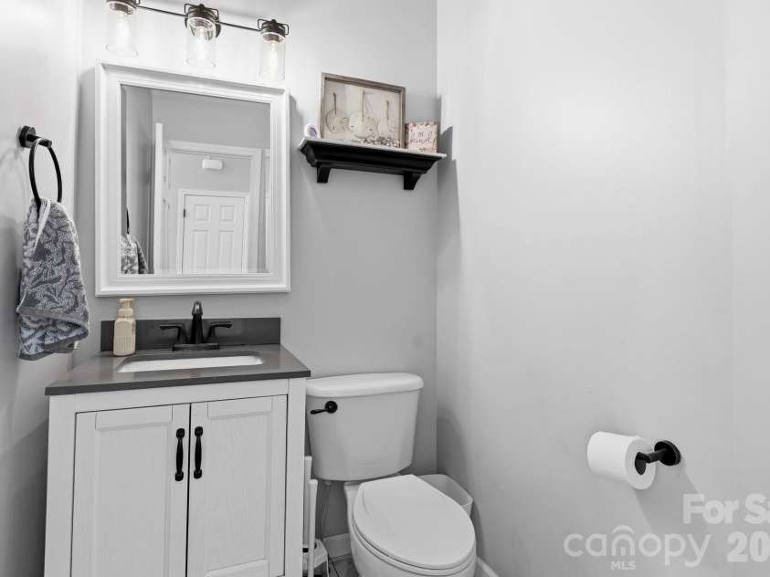 497 English Oak Road, Fletcher, NC 28732.  MLS# CAR4367697, YatesRealty ID 15501. Downstairs Half bath