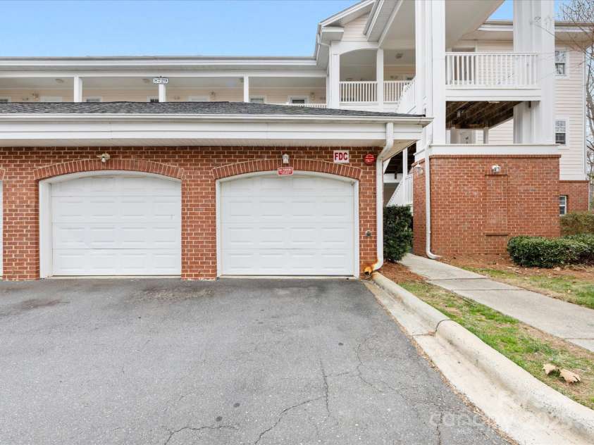 8759 Coralbell Lane, Charlotte, NC 28213.  MLS# CAR4231627, YatesRealty ID 15506. Garage