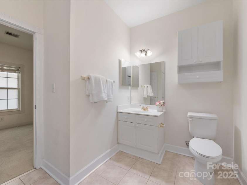 8759 Coralbell Lane, Charlotte, NC 28213.  MLS# CAR4231627, YatesRealty ID 15506. Large secondary bathroom