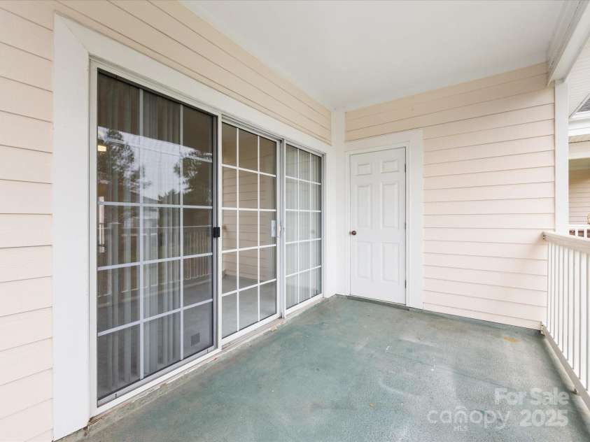 8759 Coralbell Lane, Charlotte, NC 28213.  MLS# CAR4231627, YatesRealty ID 15506. Spacious patio with storage closet