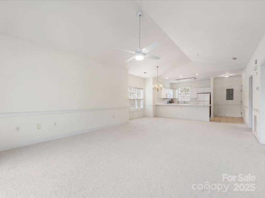 8759 Coralbell Lane, Charlotte, NC 28213.  MLS# CAR4231627, YatesRealty ID 15506. View of kitchen from great room
