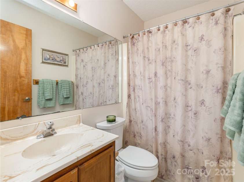 55 Lake Drive, Hendersonville, NC 28739.  MLS# CAR4263236, YatesRealty ID 15507. 