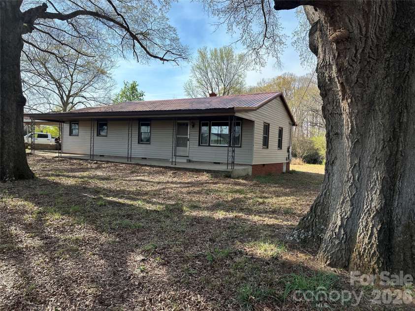 8245 Smith Road, Stanfield, NC 28163.  MLS# CAR4357357, YatesRealty ID 15507. Front of Home