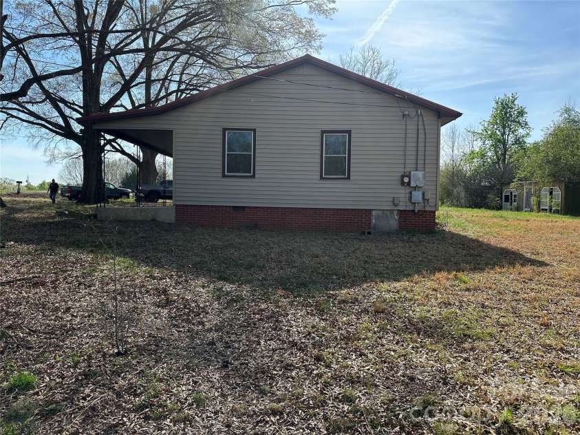 8245 Smith Road, Stanfield, NC 28163.  MLS# CAR4357357, YatesRealty ID 15507. Right side of Home