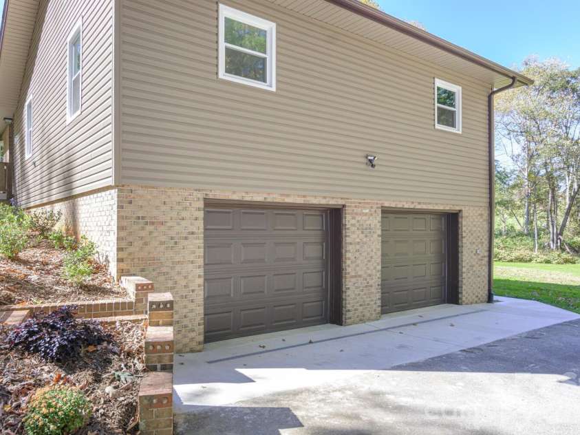 126 Anthony Drive, East Flat Rock, NC 28726.  MLS# CAR4370861, YatesRealty ID 15508. 