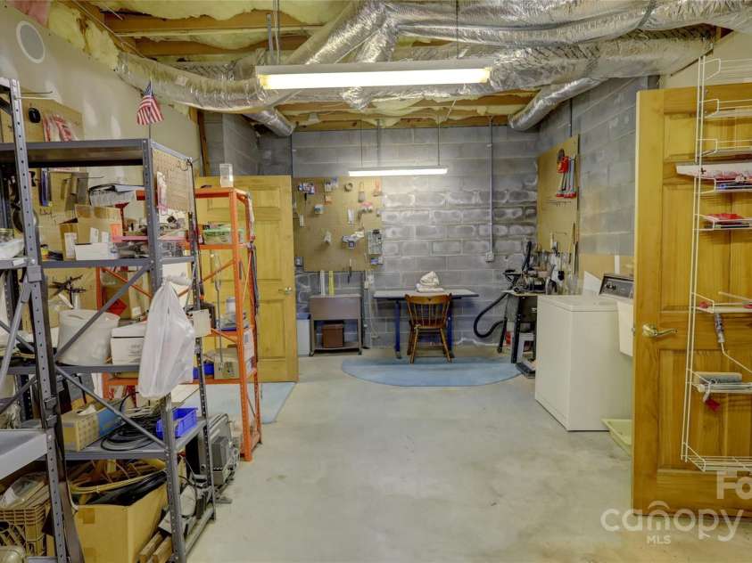 495 Bay Harbour Road, Mooresville, NC 28117.  MLS# CAR4256426, YatesRealty ID 15514. Baement workshop