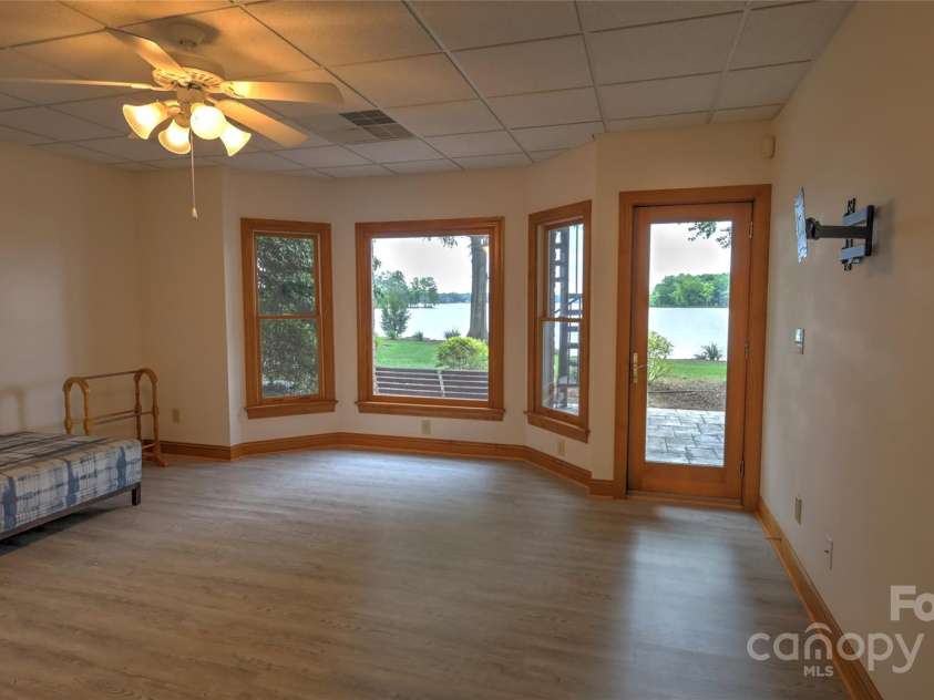 495 Bay Harbour Road, Mooresville, NC 28117.  MLS# CAR4256426, YatesRealty ID 15514. Basement owners suite with waterviews