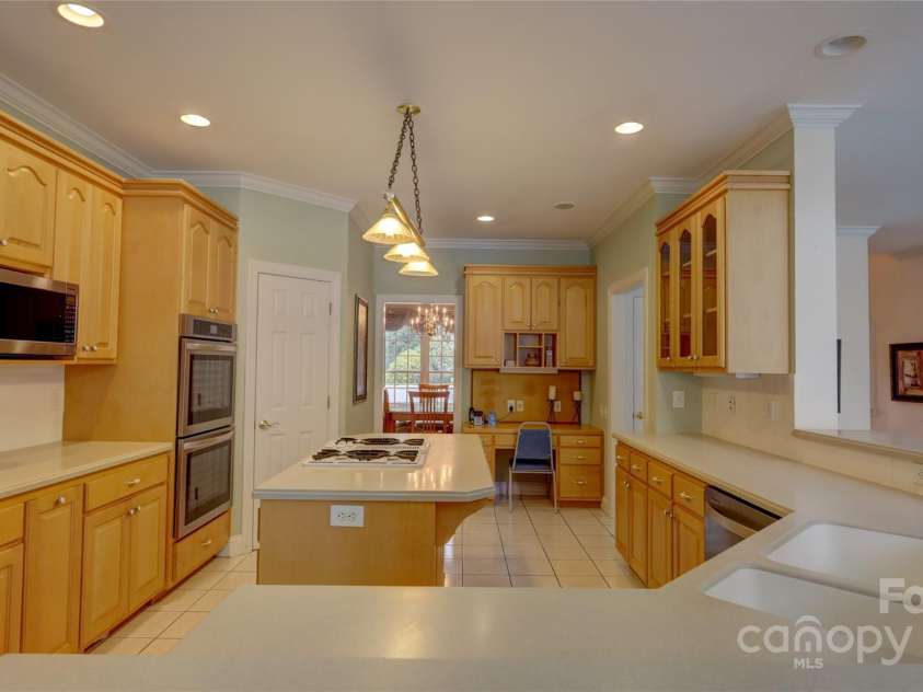495 Bay Harbour Road, Mooresville, NC 28117.  MLS# CAR4256426, YatesRealty ID 15514. Massive kitchen with tons of quality cabinets and counterspace